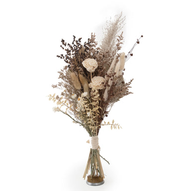 mixed white and tan dried floral bouquet against white background