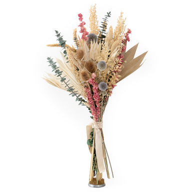 mixed white and pink dried floral bouquet against white background
