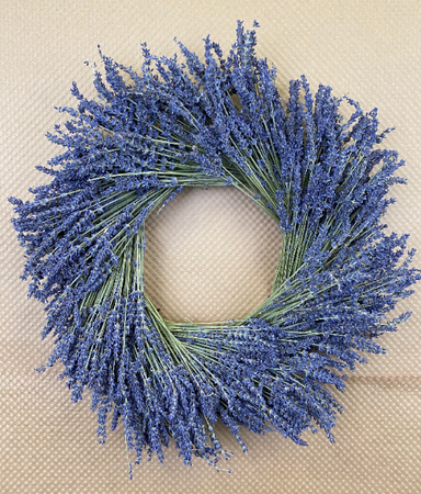 dried lavender wreath against kraft paper background